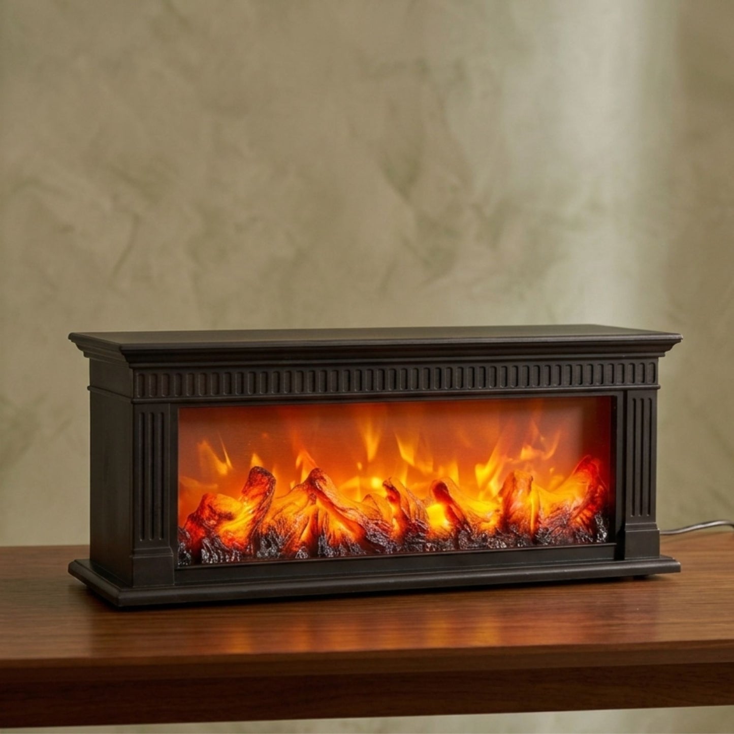 Rectangular vintage black frame fireplace lamp displaying realistic LED flame and glowing wood log effect on a wooden table.