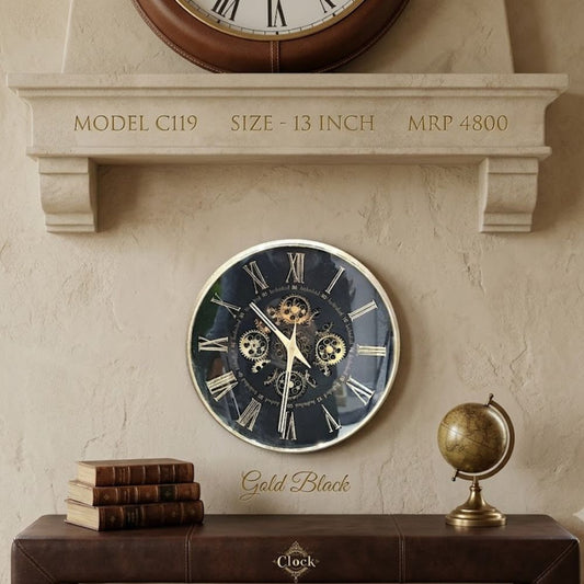 Round wall clock featuring a black dial, silver-gold Roman numerals, and exposed central golden gears inside a thin metallic frame.
