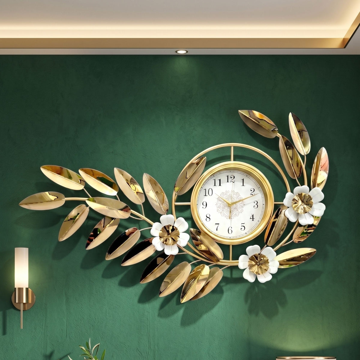 Wide decorative metal wall clock featuring metallic gold leaves, white flower accents, and a central round dial.
