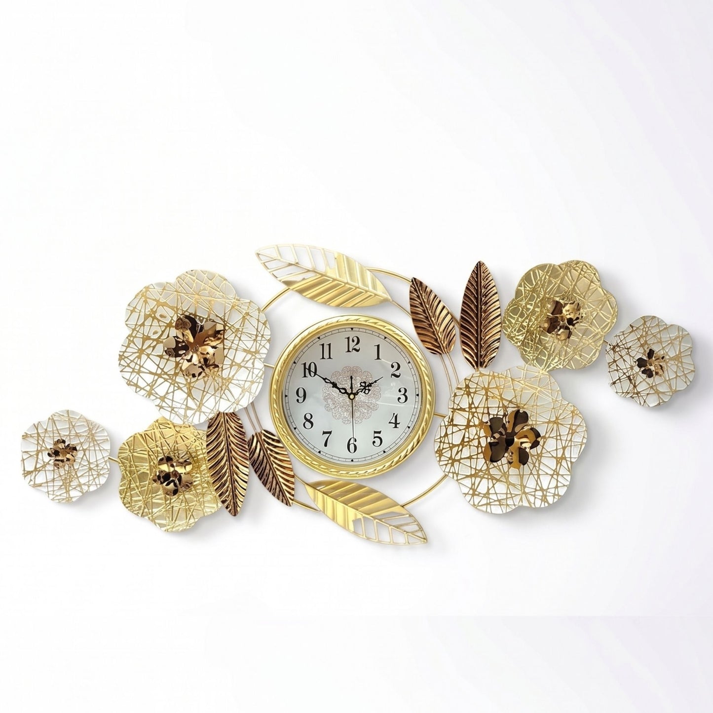 Wide metal wall clock with central gold dial, surrounding cream mesh flower petals, and accent leaves.