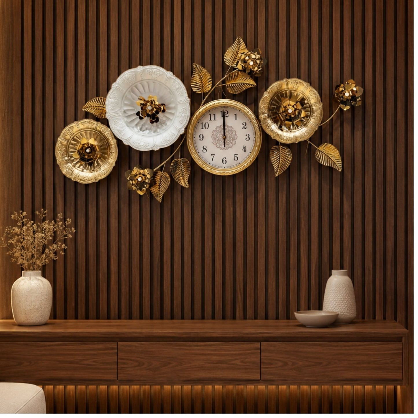 Wide metal wall clock with round dial, surrounded by decorative gold and white flowers with leaves.
