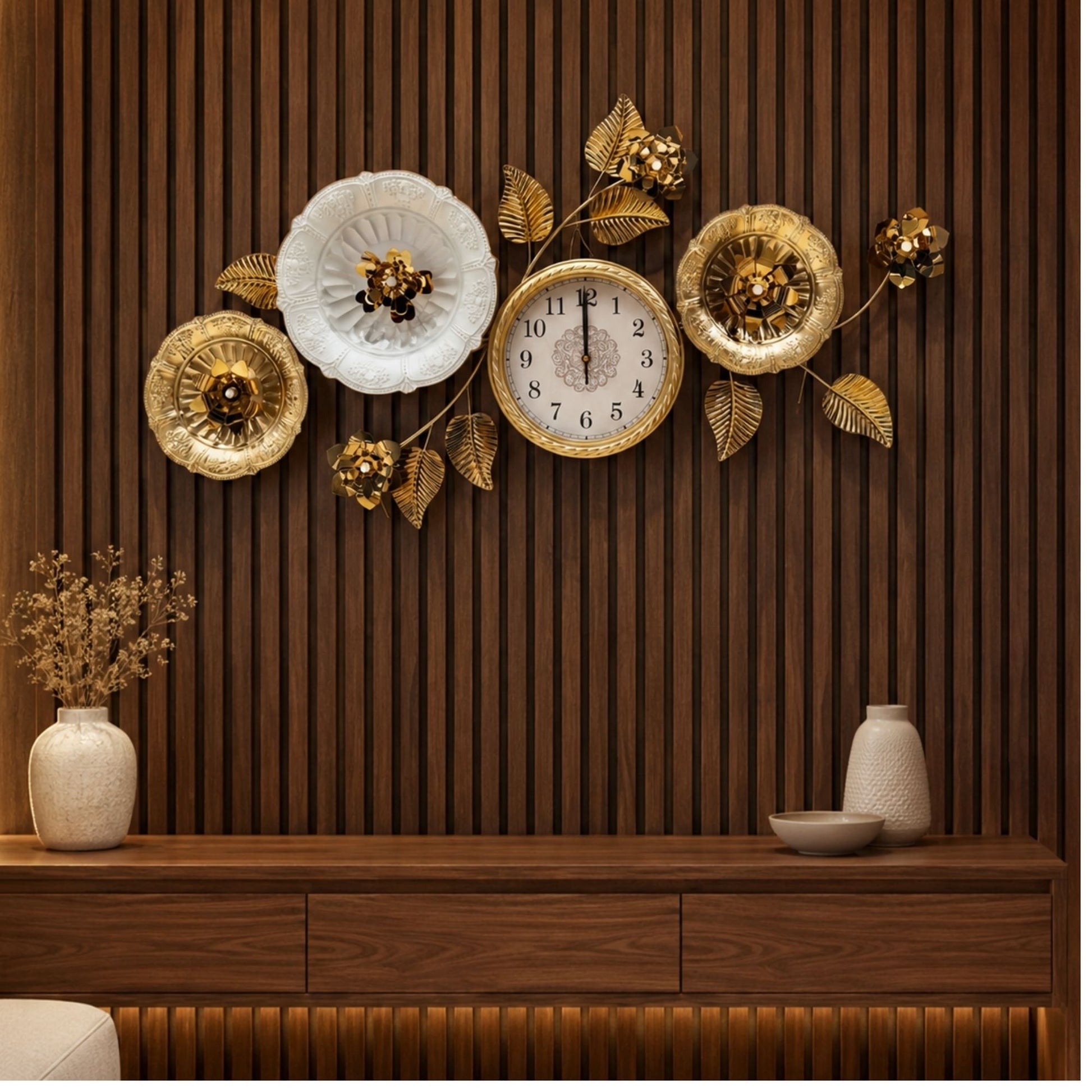 Wide metal wall clock with round dial, surrounded by decorative gold and white flowers with leaves.